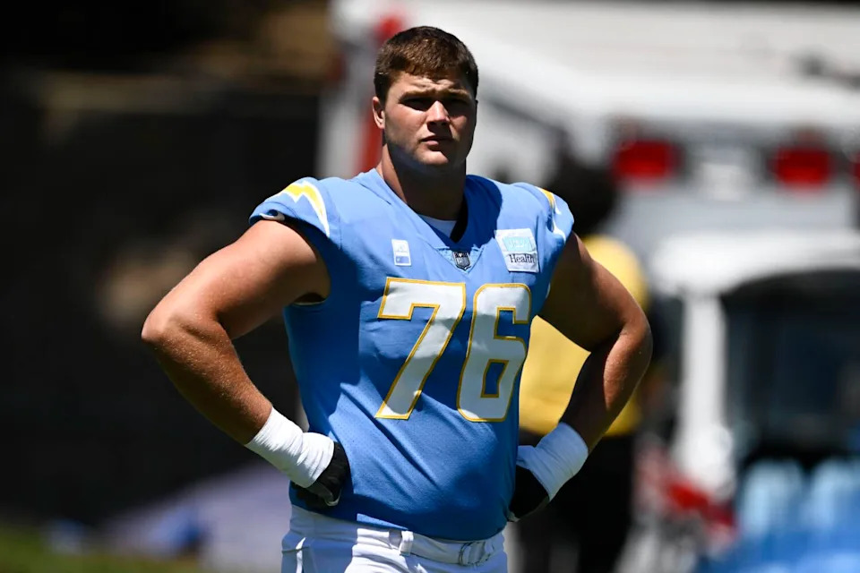 Chargers offensive tackle Joe Alt takes a break during drills at training camp on July 23.