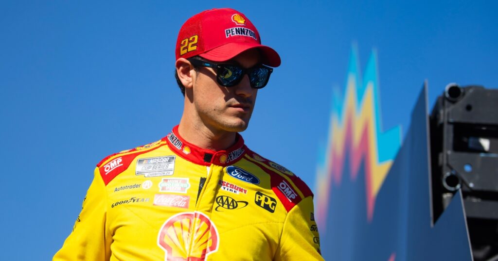 NASCAR Cup champion Joey Logano pulls up in No. 22 car, does burnout for Clemson Football