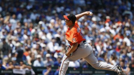 Tomoyuki Sugano earns 10th victory as Orioles outlast Mariners 5-3 after long rain delay