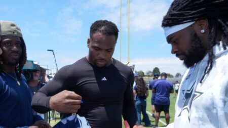 Micah Parsons remains in camp despite not attending practice