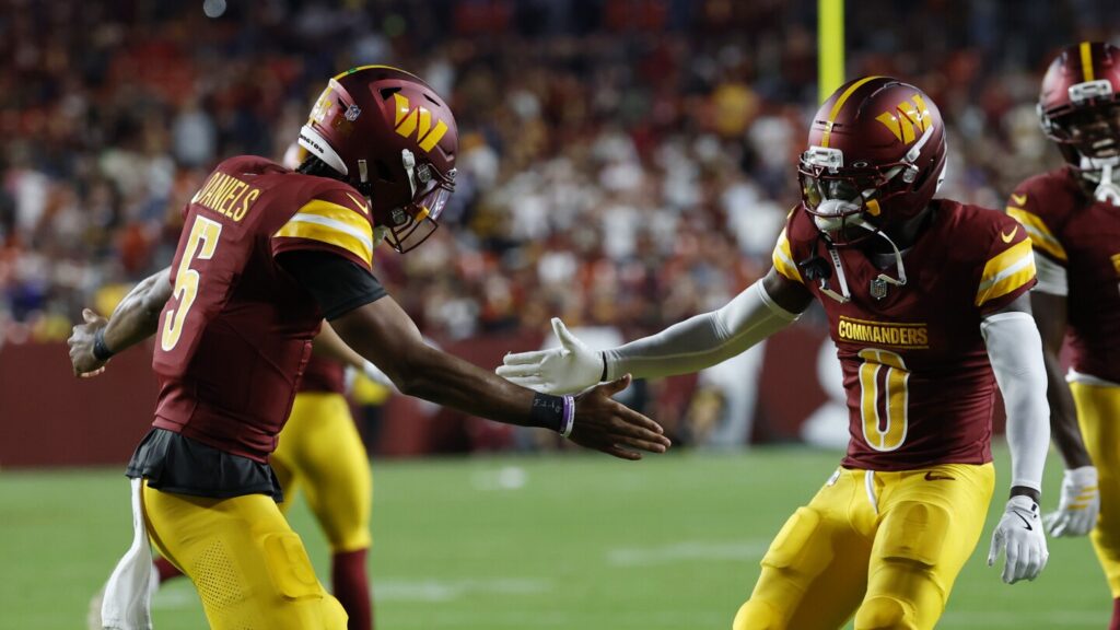 Jayden Daniels runs for a touchdown in his one series