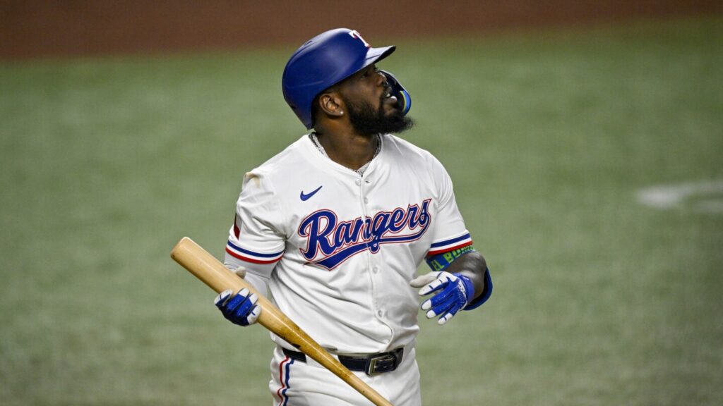 Rangers put struggling slugger Adolis Garcia on IL and activate Evan Carter