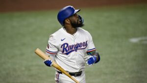 Rangers put struggling slugger Adolis Garcia on IL and activate Evan Carter