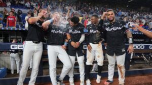 Edwards, Ramírez help Marlins come from behind to beat Yankees 13-12