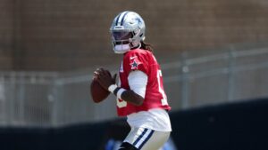 Joe Milton banged his thumb on a helmet but is expected to be OK