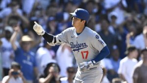 Ohtani high-fives a heckler after his homer to cap Dodgers’ comeback rivalry win over Padres