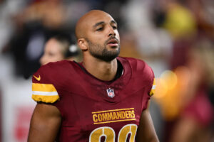 Commanders RB Austin Ekeler carted off with Achilles injury vs. Packers