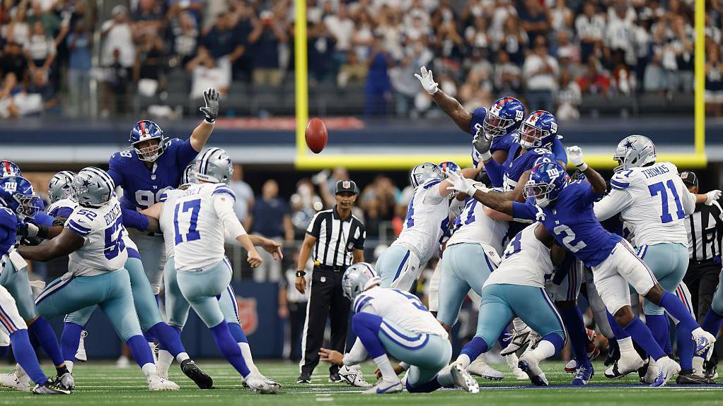 Brandon Aubrey of the Dallas Cowboys kicks a field goal in their NFL victory over the New York Giants