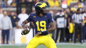 Michigan freshman Bryce Underwood reminds Oklahoma coach Brent Venables of former Clemson star quarterback