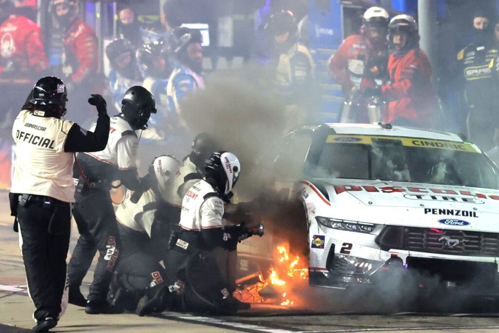 On fire and inhaling smoke, Cindric barely advances in playoffs