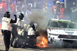 On fire and inhaling smoke, Cindric barely advances in playoffs