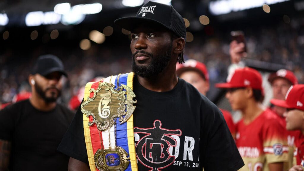 New undisputed champ Terence Crawford leads Nebraska on to the field ahead of key clash with Michigan