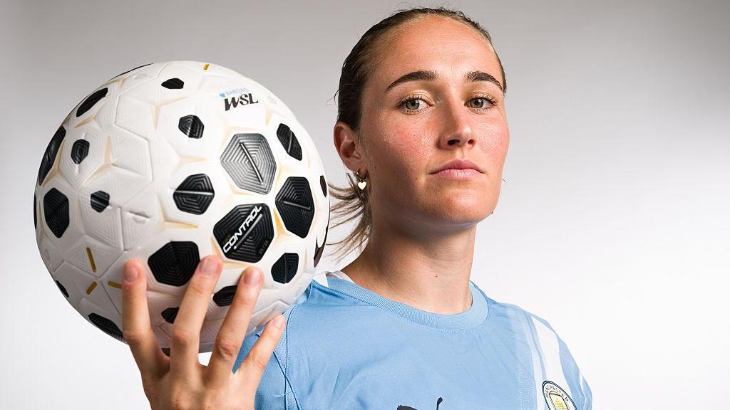 Sydney Lohmann holding WSL football