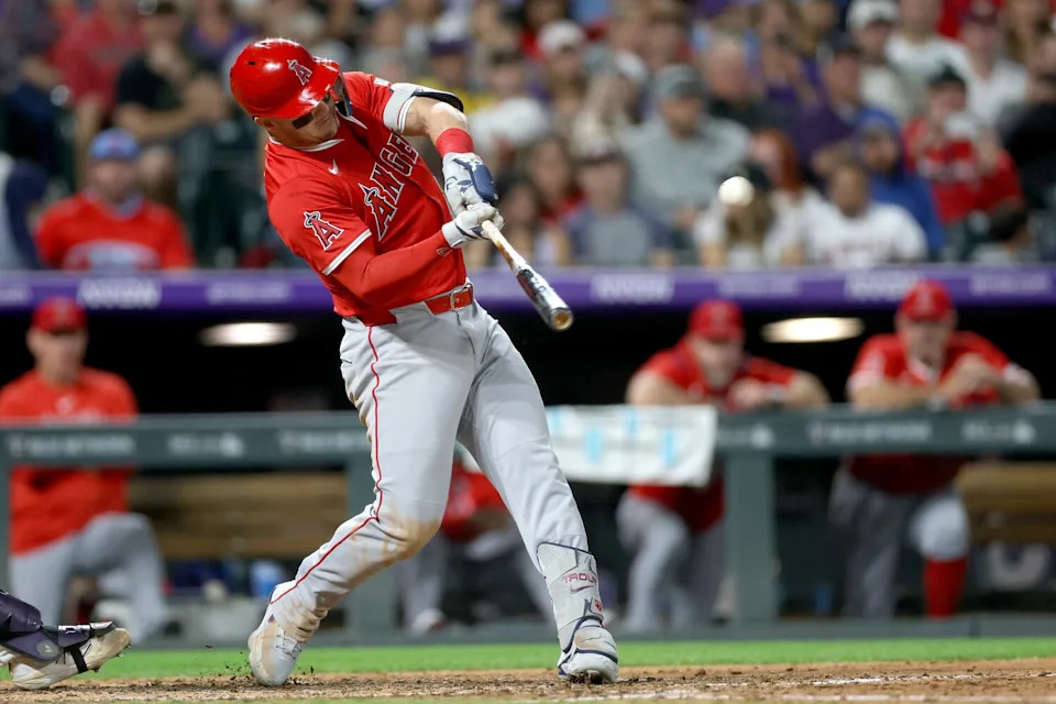 DENVER, COLORADO - SEPTEMBER 20: Mike Trout #27 of the Los Angeles Angels hits.