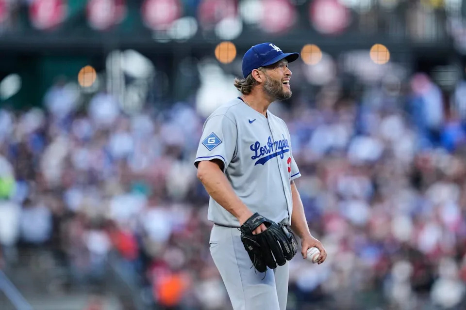 Dodgers starting pitcher Clayton Kershaw reacts after giving up an RBI single in the first inning Saturday.