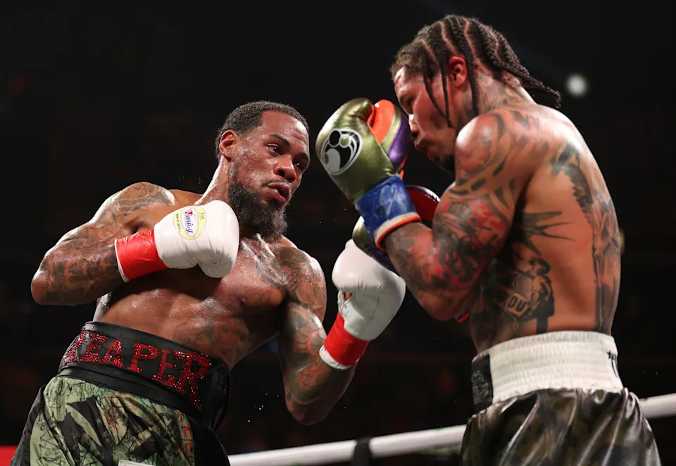 NEW YORK, NEW YORK - MARCH 01: Lamont Roach Jr. punches Gervonta Davis during their bout for Davis' WBA lightweight title at Barclays Center on March 01, 2025 in New York City. (Photo by Al Bello/Getty Images)
