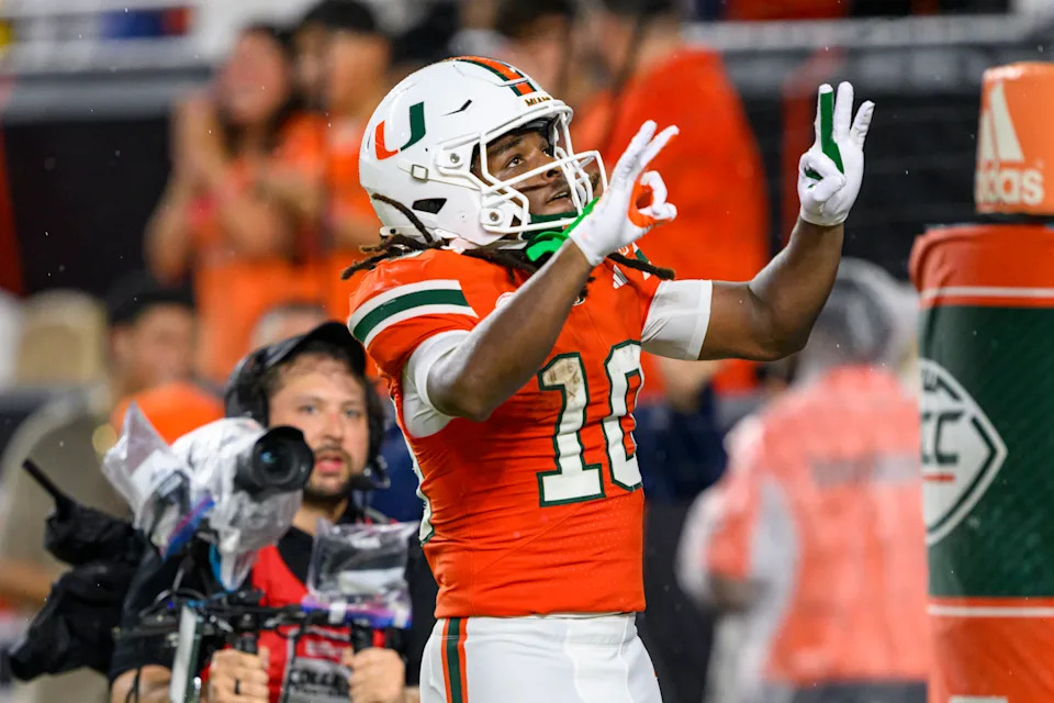 MIAMI GARDENS, FL - AUGUST 31: Miami Hurricanes wide receiver Malachi Toney (10) gestures as he celebrates scoring a touchdown during the college football game against the Notre Dame Fighting Irish on August 31, 2025 at the Hard Rock Stadium in Miami Gardens, FL. (Photo by Doug Murray/Icon Sportswire via Getty Images)