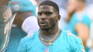 Dolphins’ Tyreek Hill Hospitalized with Knee Injury After Being Carted Off vs. Jets 