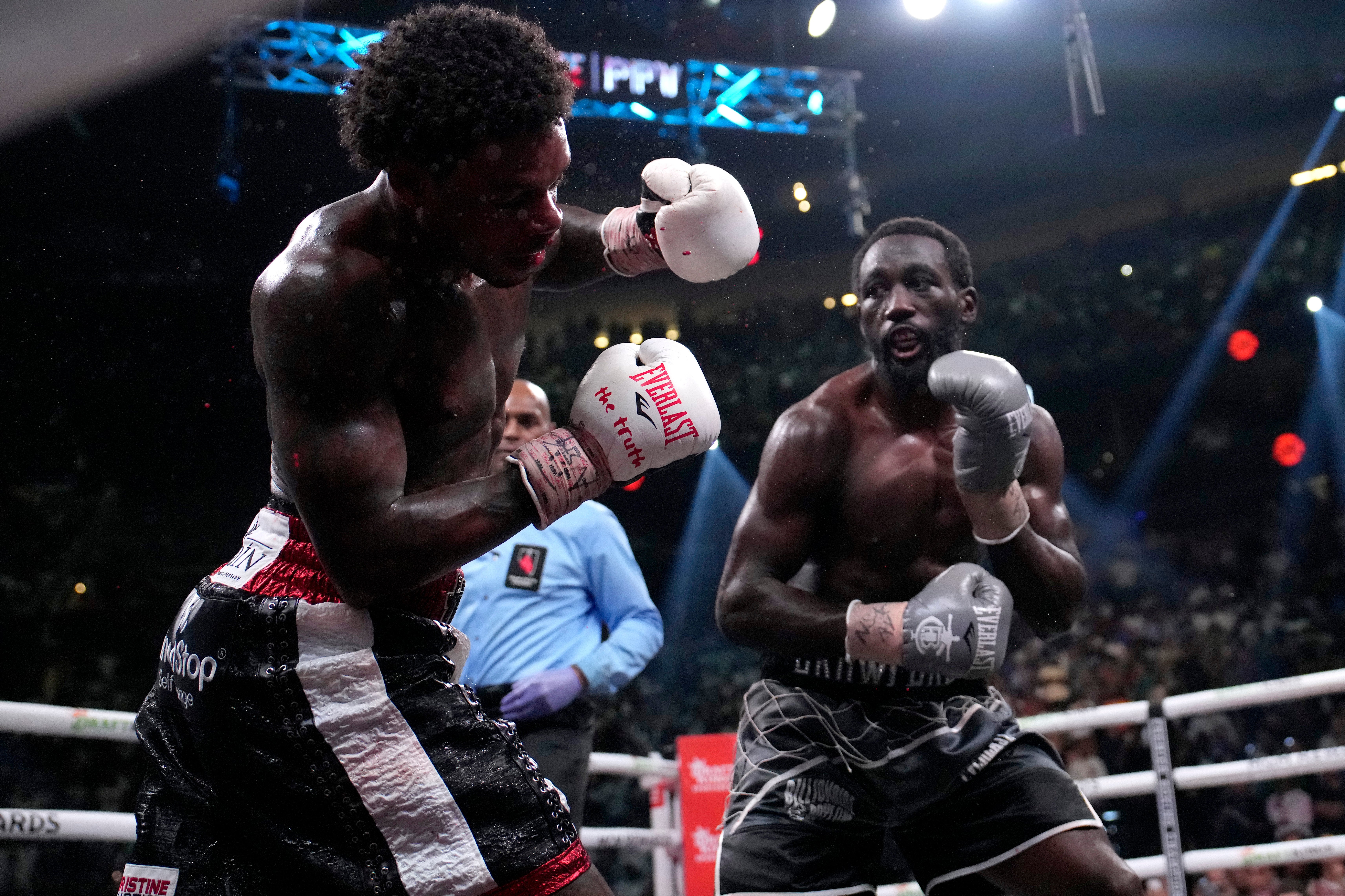 Terence Crawford (right) took apart Errol Spence Jr with ease in Vegas