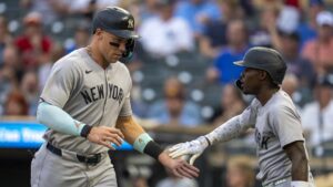 Yankees survive shaky bullpen to hold one for 10-9 win over Twins
