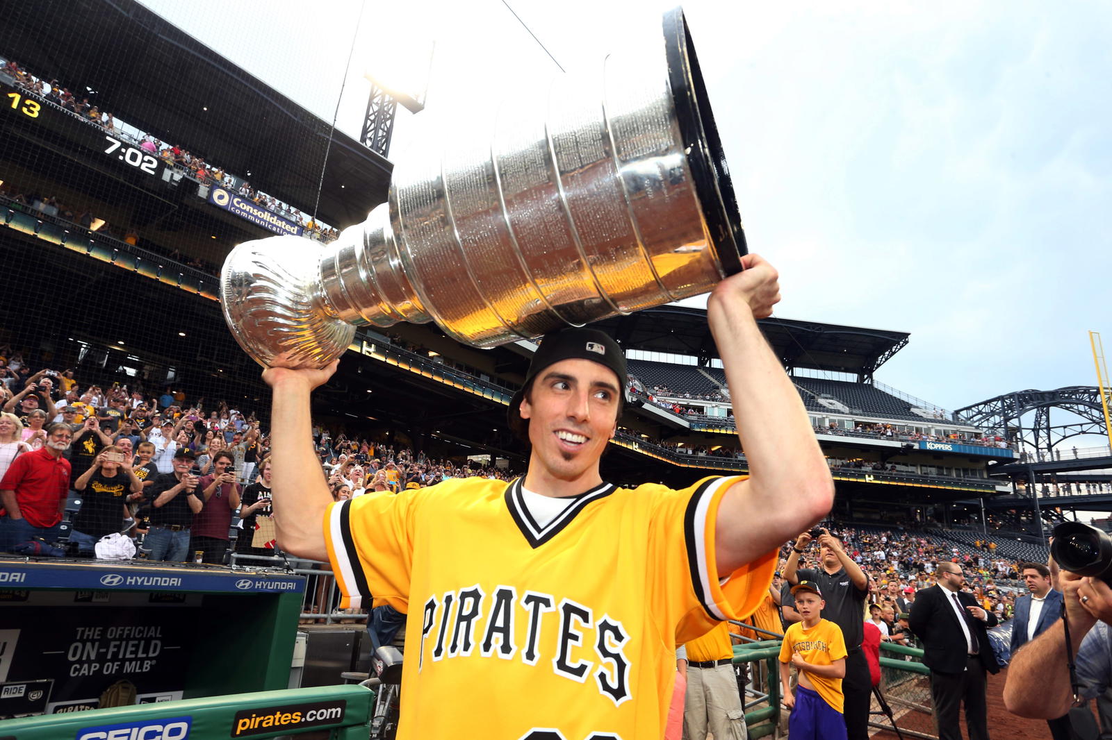 Jun 13, 2017; Pittsburgh, PA, USA; Pittsburgh Penguins goalie Marc-Andre Fleury (29) carries the Stanley Cup onto the field before the Pittsburgh Pirates play the Colorado Rockies at PNC Park. Mandatory Credit: Charles LeClaire-Imagn Images