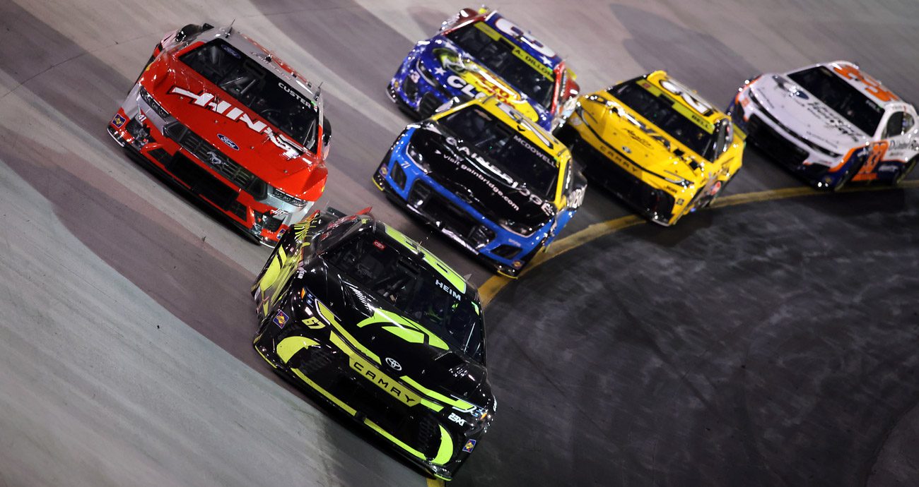 Corey Heim races at Bristol ahead of Cole Custer, Michael McDowell, Austin Dillon and Christopher Bell.