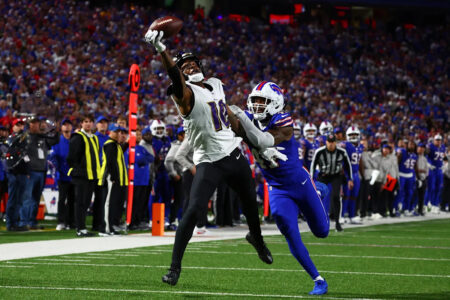 Ravens QB Lamar Jackson shoves Bills fan who struck him and DeAndre Hopkins on the helmet after a TD in loss
