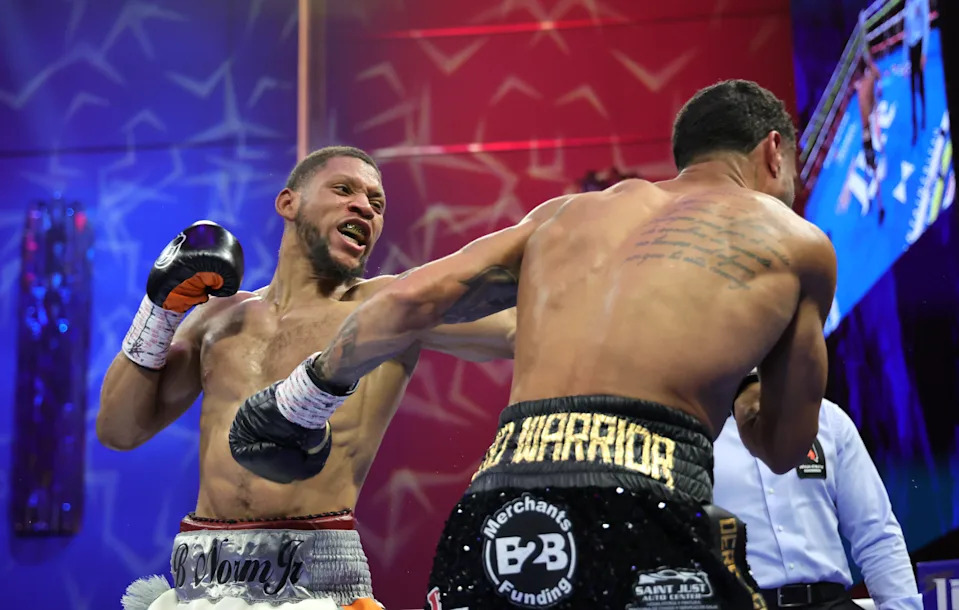 LAS VEGAS, NEVADA - MARCH 29: WBO welterweight champion Brian Norman Jr. (L) lands a punch that sends Derrieck Cuevas to the canvas in the third round of a title fight at BleauLive Theater at Fontainebleau Las Vegas on March 29, 2025 in Las Vegas, Nevada. Norman retained his title with a third-round TKO. (Photo by Steve Marcus/Getty Images)