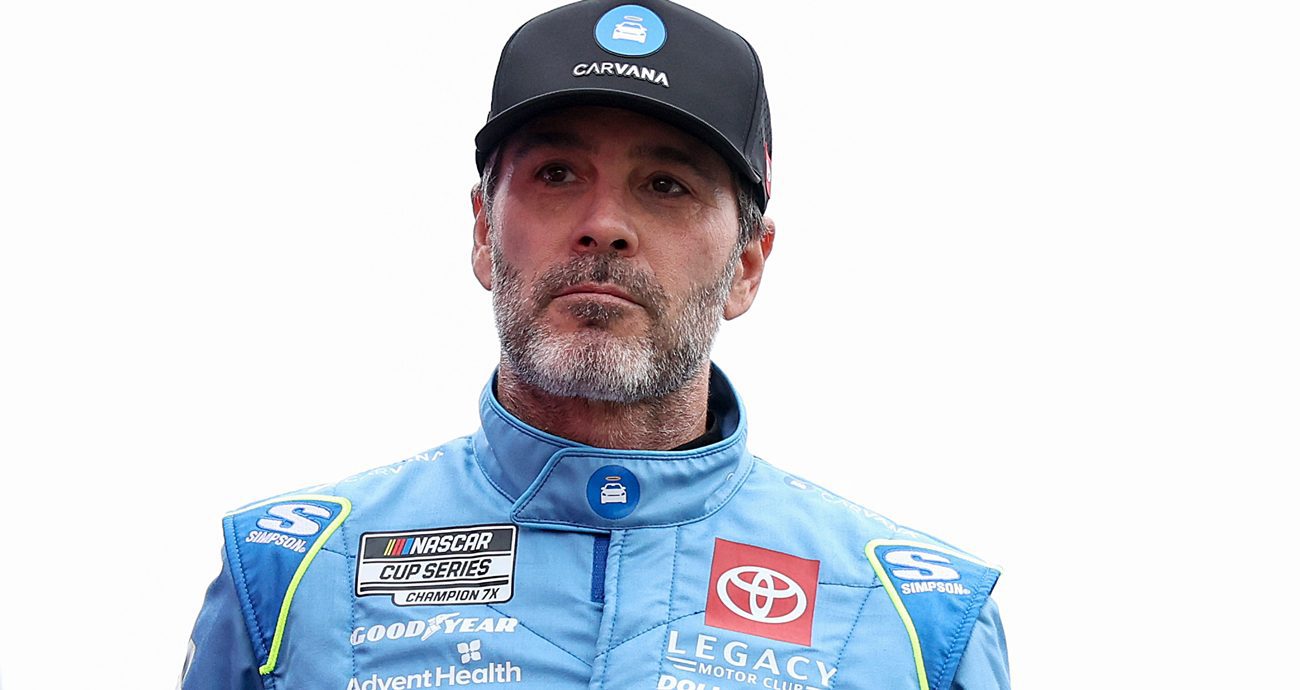 Jimmie Johnson, driver of the No. 84 Carvana Toyota, walks onstage during driver intros before the NASCAR Cup Series Coca-Cola 600 at Charlotte Motor Speedway on May 25, 2025 in Concord, North Carolina. 