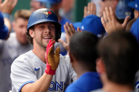 Blue Jays clinch postseason spot with 8-5 win over Royals; AL East title in reach