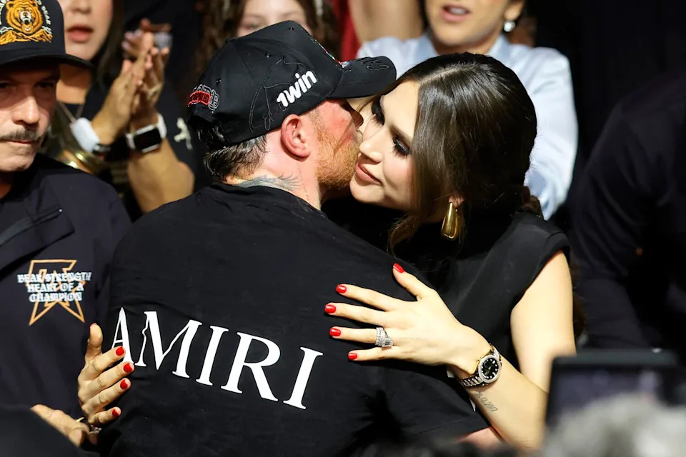 Canelo Álvarez kisses his wife, Fernanda Gomez, after losing to Terence Crawford (not pictured)
