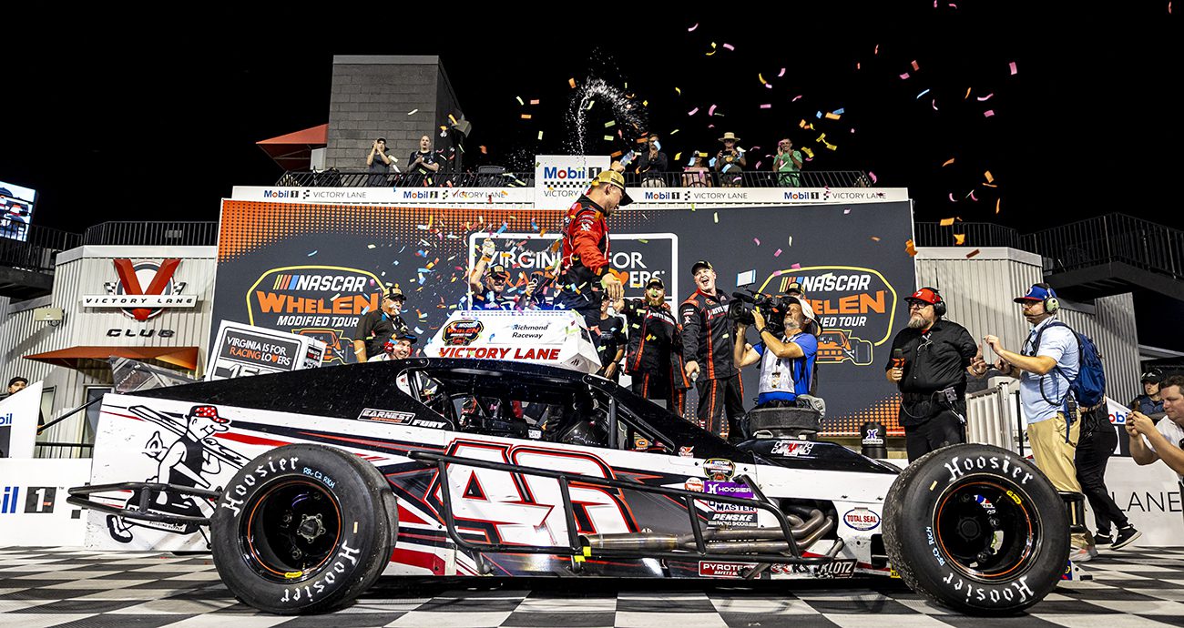 Craig Lutz, driver of the #46 Riverhead Building Supply modified, celebrates after winning the Virginia Is For Racing Lovers 150 for the NASCAR Whelen Modified Tour at Richmond Raceway in Richmond, Virginia on August 14, 2025. (Rob Branning/NASCAR)