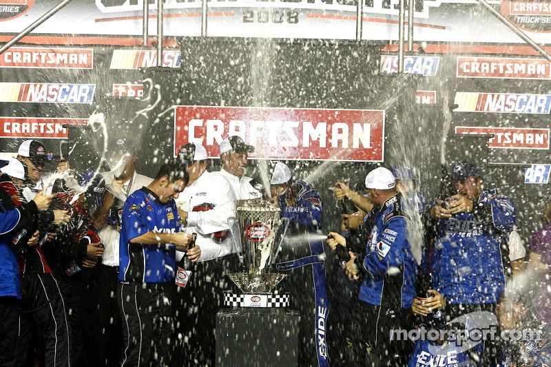 Championship victory lane: 2008 NASCAR Craftsman Truck Series champion Johnny Benson celebrates