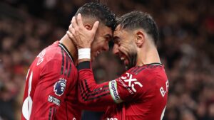 Manchester United 2-1 Chelsea: Red Devils win rambunctious clash