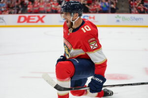Panthers open season with victory over Chicago after raising Stanley Cup banner