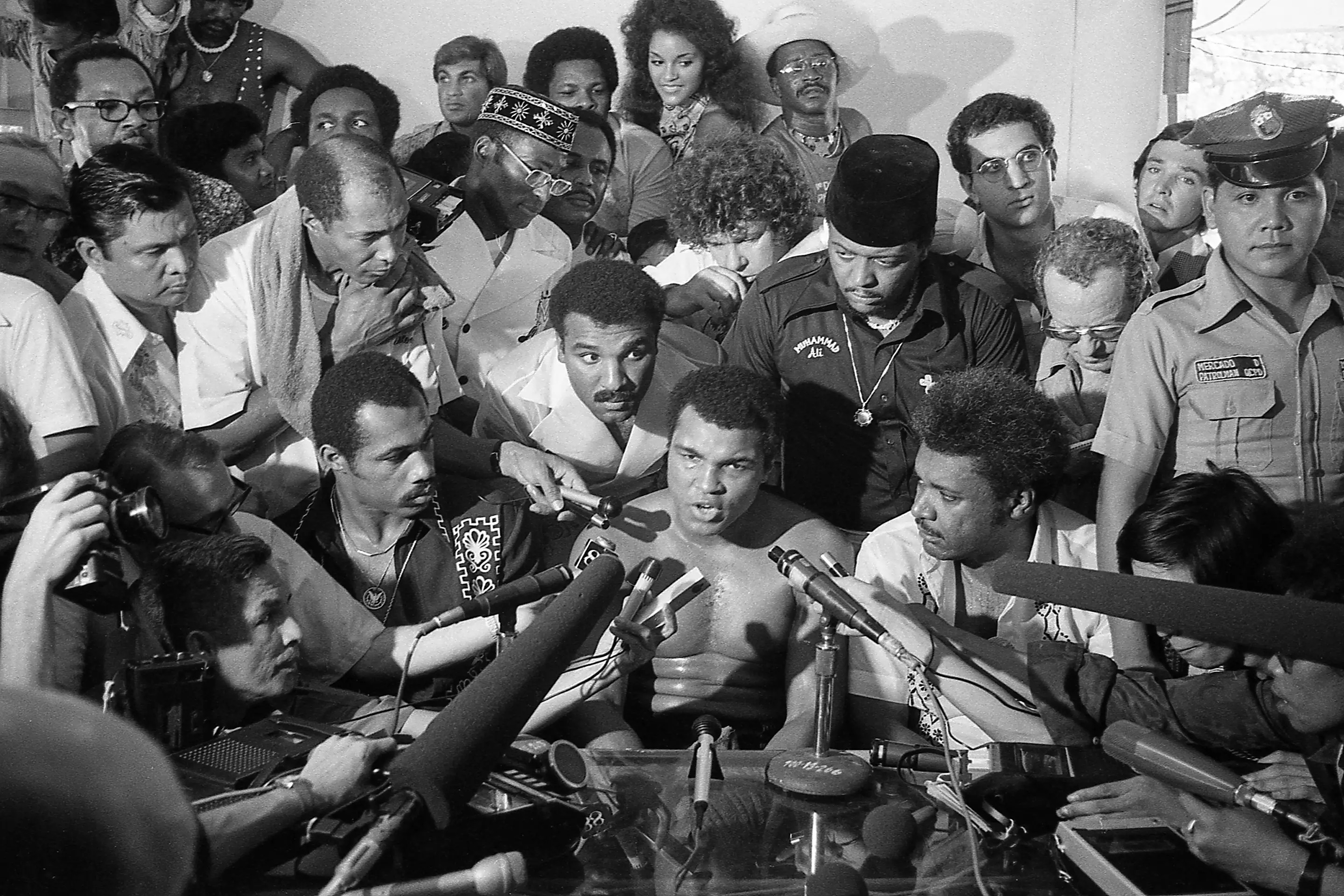 MANILA - SEPTEMBER 1975: World Heavyweight boxing champion Muhammad Ali speaks to the international press during break in training in gym days before his heavyweight bout against Joe Frazier in September 1975 (photo by nik wheeler/Corbis via Getty Images)