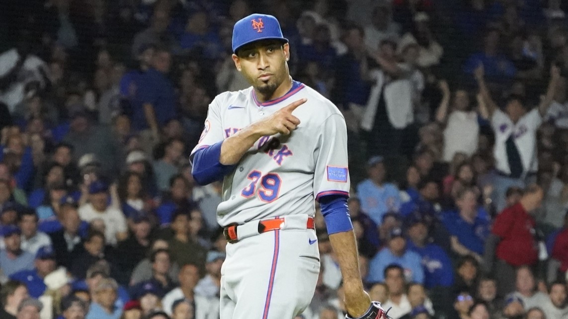 Sep 25, 2025; Chicago, Illinois, USA; New York Mets pitcher Edwin Díaz (39) gestures after getting the final out against the Chicago Cubs during the ninth inning at Wrigley Field.