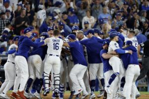 Plaschke: A wild finish propels the Dodgers into NLCS and past their toughest playoff test