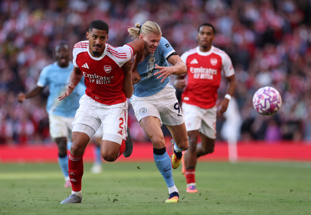 LONDON, ENGLAND - SEPTEMBER 21: William Saliba of Arsenal battles for possession with Erling Haaland of Manchester City during the Premier League match between Arsenal and Manchester City at Emirates Stadium on September 21, 2025 in London, England. (Photo by Justin Setterfield/Getty Images)