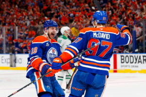 Knoblauch Extension, McDavid Speculation, and Opening Night Decisions