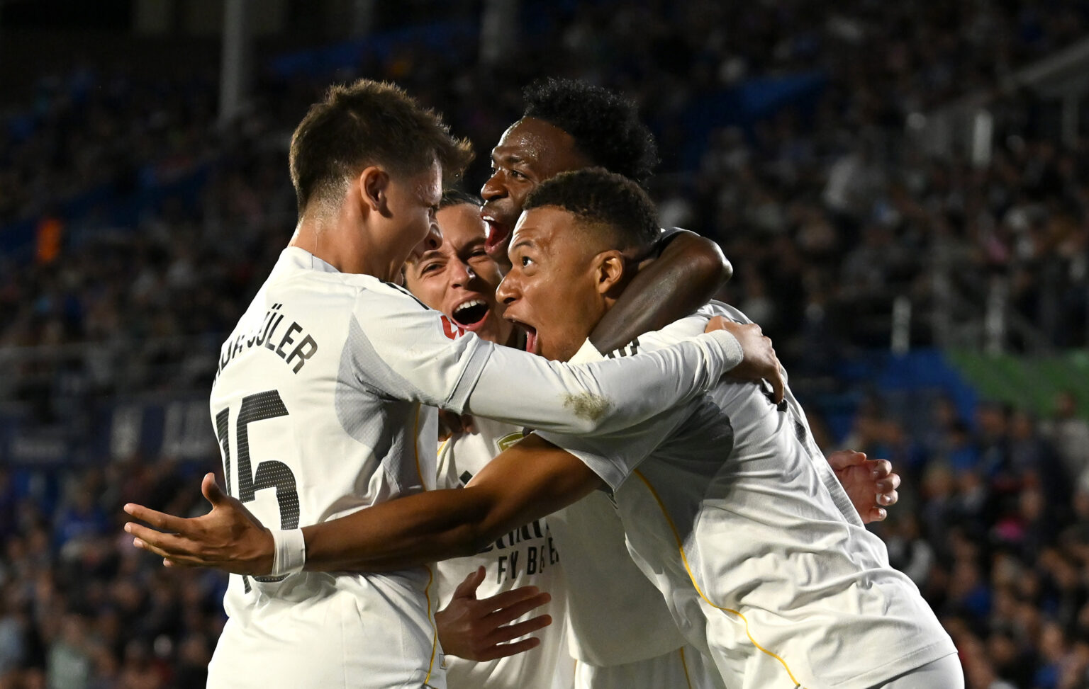 Real Madrid strike late to see off 9-man Getafe in edgy encounter Real Madrid strike late to see off 9-man Getafe in edgy encounter
