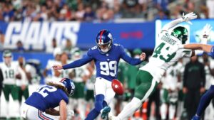 Giants sign K Jude McAtamney, LB Neville Hewitt to active roster
