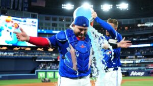 Kirk homers twice as Blue Jays end playoff skid by thumping Yankees 10-1 in Game 1 of ALDS