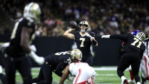Taysom Hill, listed as a QB on the roster, could serve as Spencer Rattler’s backup
