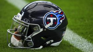 Who will be the Titans’ interim head coach?