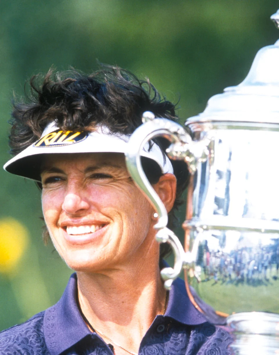 Juli Inkster holds the U.S. Women's Open trophy after winning the 2002 U.S. Women's Open at Prarie Dunes Country Club in Hutchinson, Kansas. (Photo: J.D. Cuban/USGA)