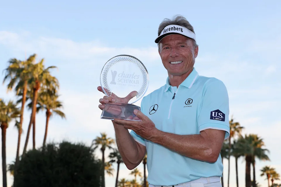Bernhard Langer poses with the Charles Schwab Cup Championship trophy at Phoenix Country Club. (Christian Petersen/Getty Images)
