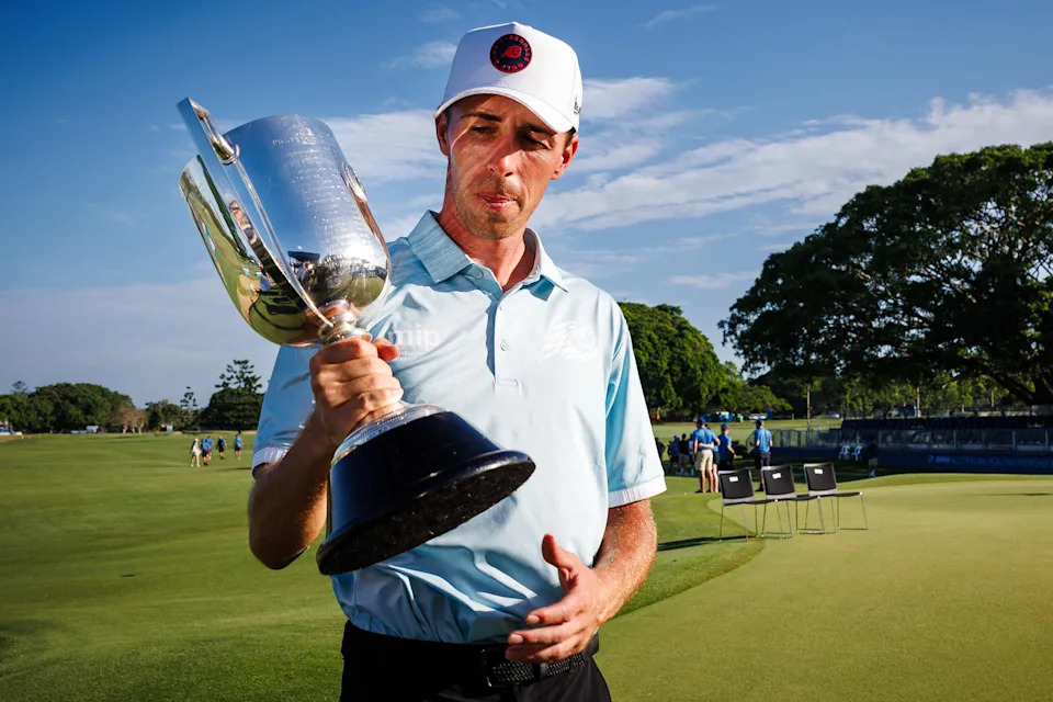 David Puig holds the Joe Kirkwood Cup after winning the 2025 Australian PGA Championship at Royal Queensland Golf Club.