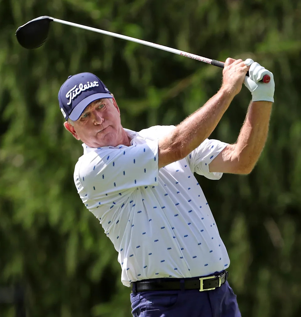 Jay Haas watches his shot down the fairway on the 13th hole during second round of the Bridgestone Senior Players at Firestone Country Club. (Photo: Akron Beacon Journal)