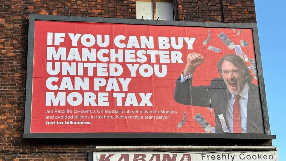 A billboard showing Ratcliffe at Cheetham Hill, Manchester, by campaign group Everyone Hates Elon (PA)